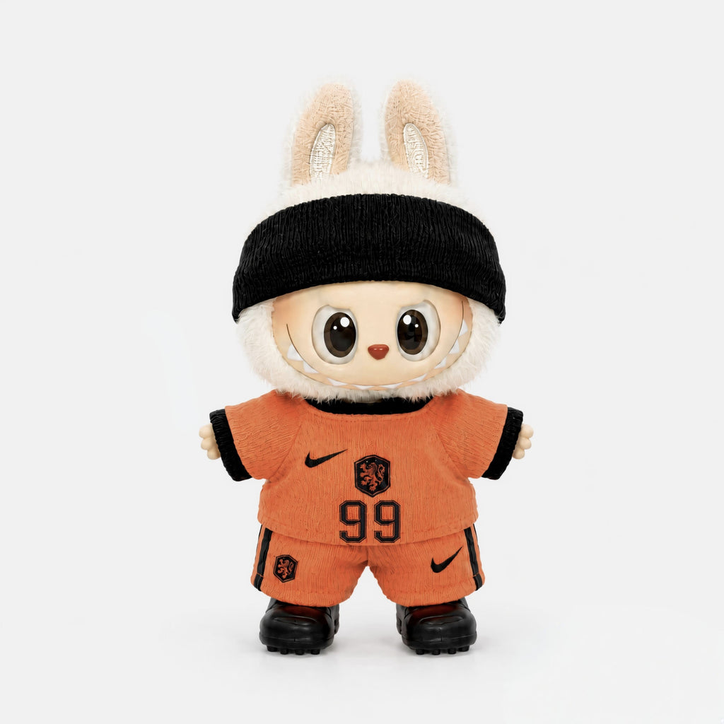 Custom doll football jersey kit – Netherlands Home – personalised with your own name and number, shown worn on a doll, compatible with Labubu and similar 17cm dolls
