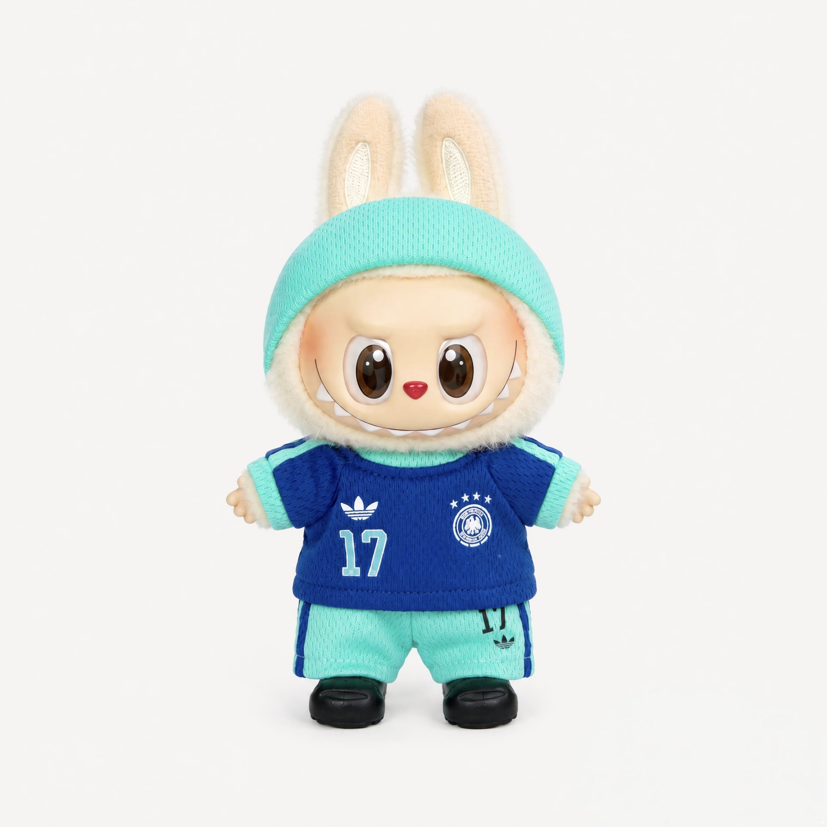 Doll football jersey kit – Germany Away – shown worn on a doll, compatible with Labubu and similar 17cm dolls